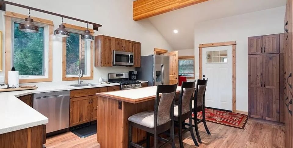 Another shot of the entry, kitchen, and breakfast bar.
