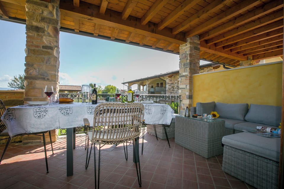 Family Apartment, 2 Bedrooms, Balcony (Casa Valtenesi- Polpenazze Lake Garda) | Outdoor dining