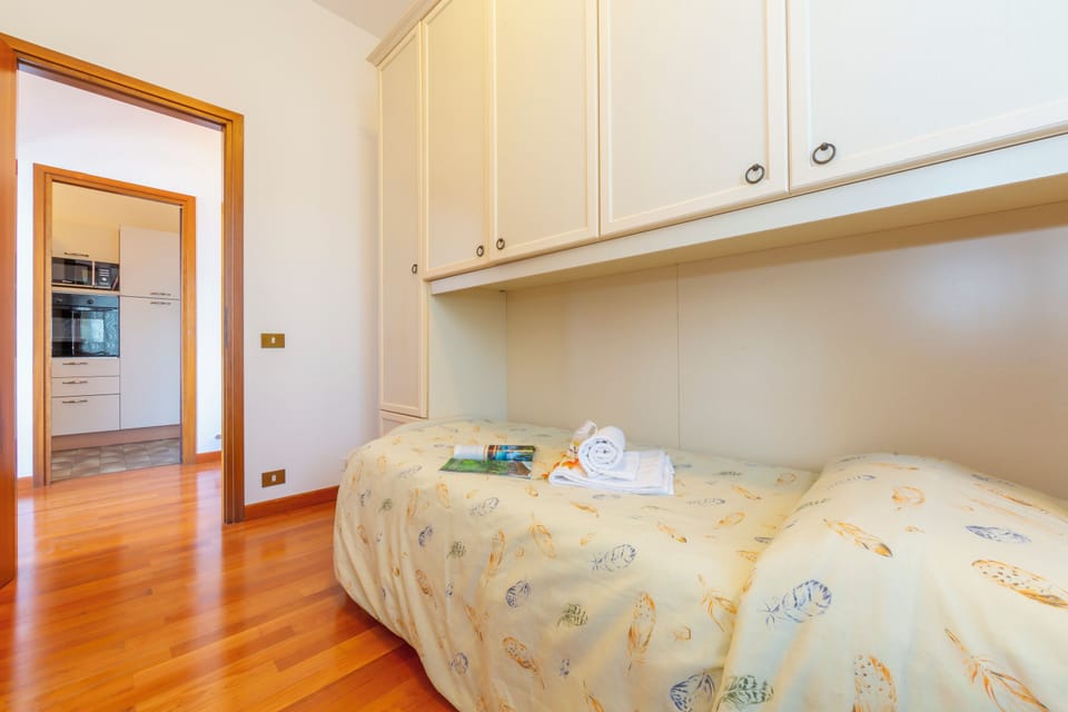 Family Apartment, Multiple Bedrooms, Mountainside (La Rosa Dei Venti Lake View Terrace) | 2 bedrooms, iron/ironing board, free WiFi, bed sheets