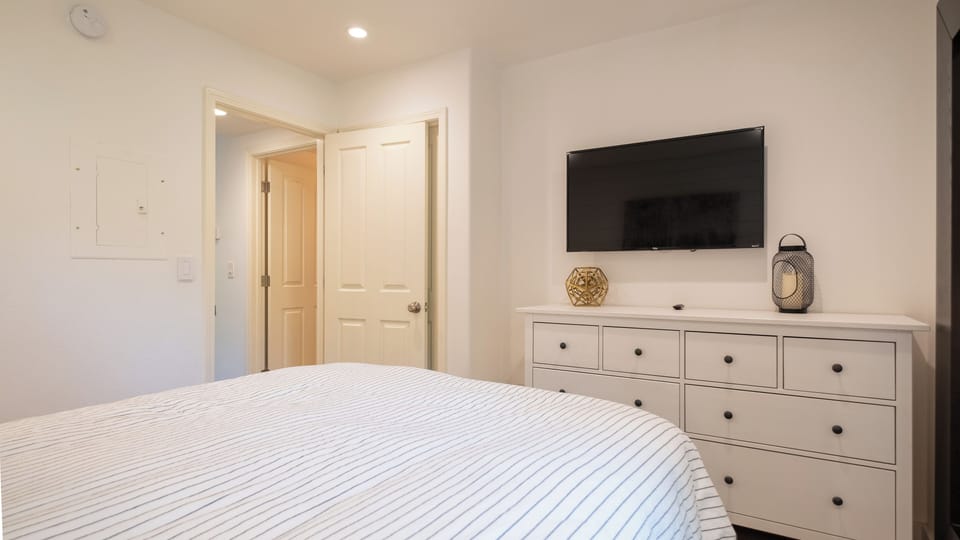 Bedroom TV:  Sweetbriar Garden Suite