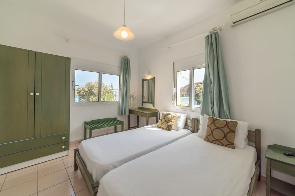 Apartment, 2 Twin Beds, Sea View | Desk, laptop workspace, free WiFi