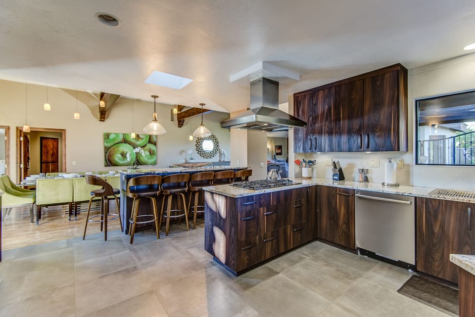 Expansive and Fully Equipped Kitchen with Island Seating
