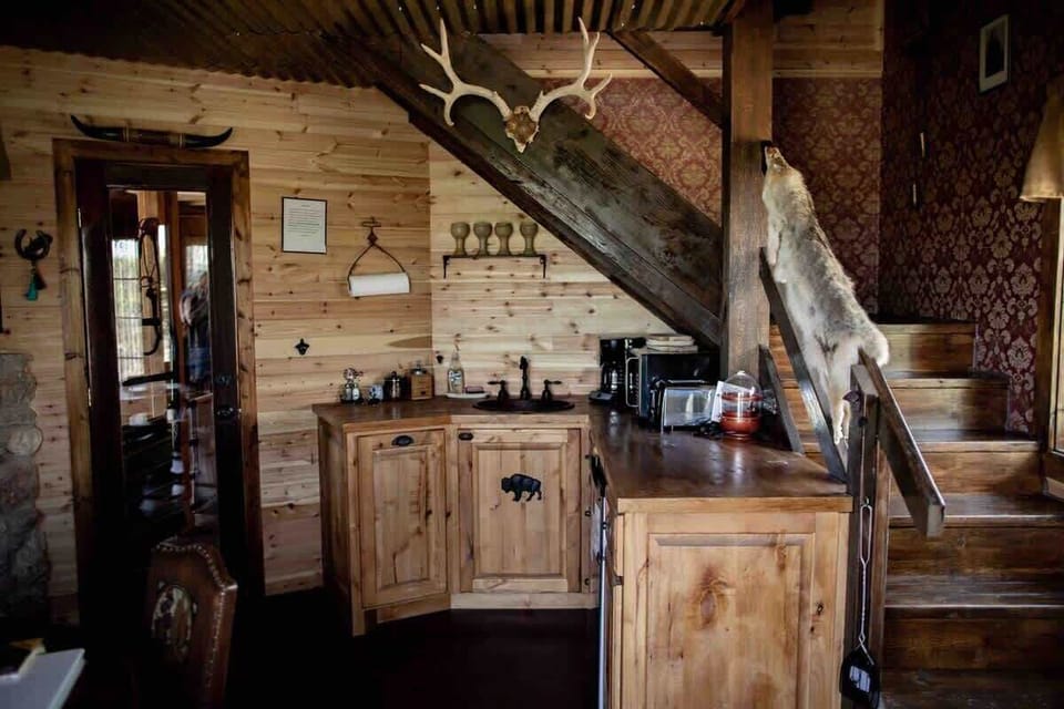Kitchenette at Rider’s Roost. Stairs to living and sleeping areas. 