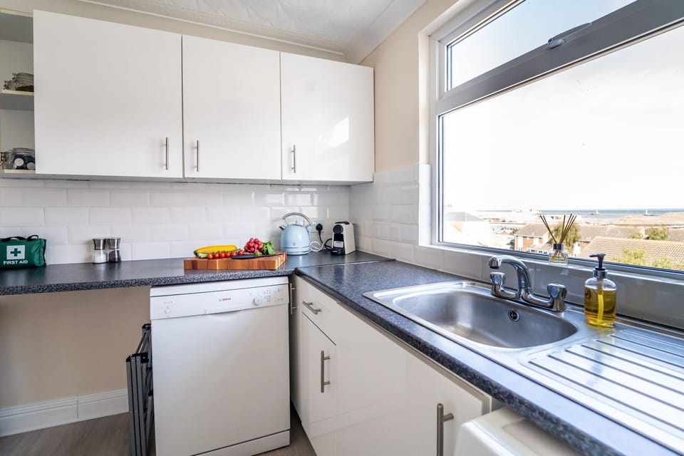 Penthouse, 2 Bedrooms, 2 Bathrooms, Sea View | Private kitchen | Highchair, dining tables