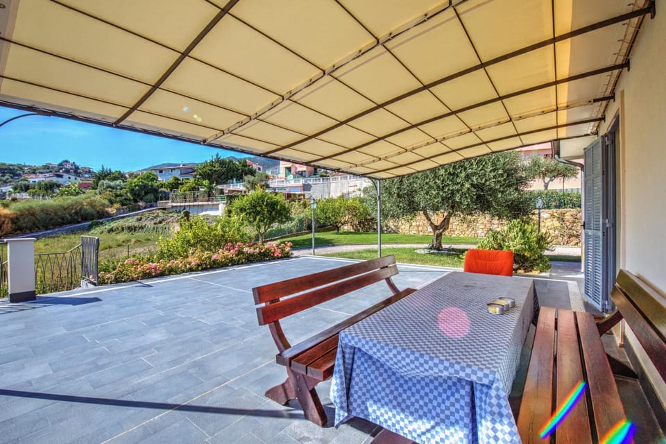 Family Villa, Multiple Bedrooms, Mountainside (Villa Lucia Riviera dei Fiori Pool) | Outdoor dining