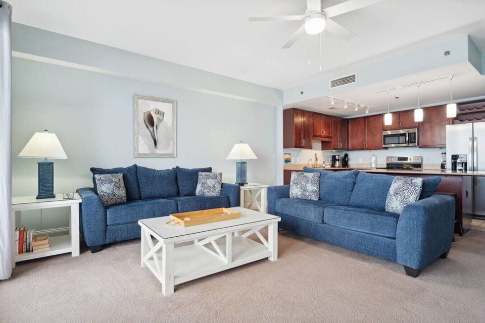 Living room with flat screen TV and fold out couch