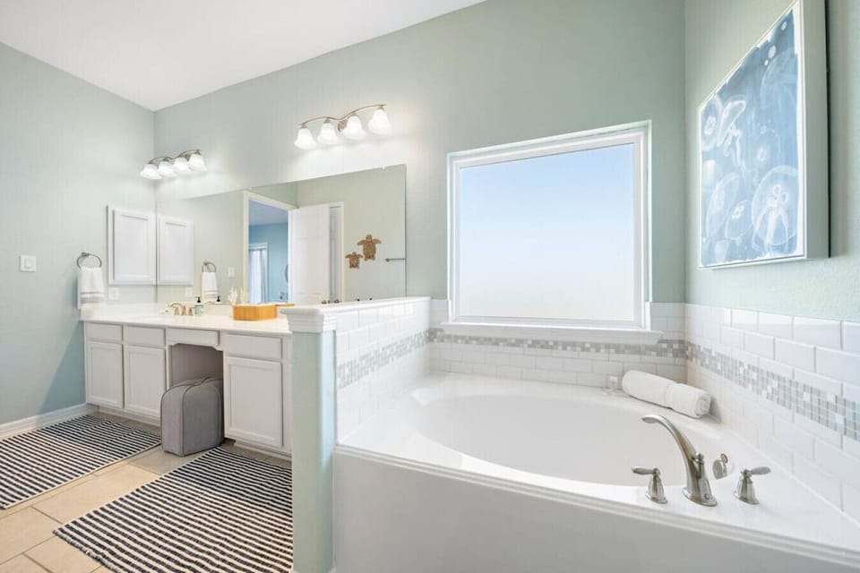 This bathroom offers a place to relax after a long day