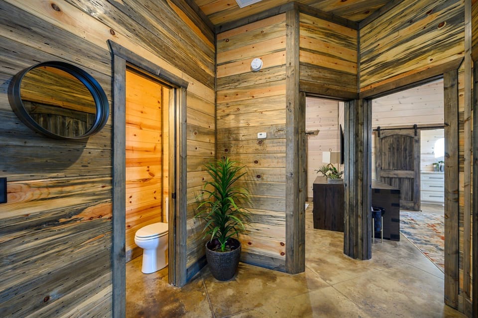 Just off the living area is the powder room.