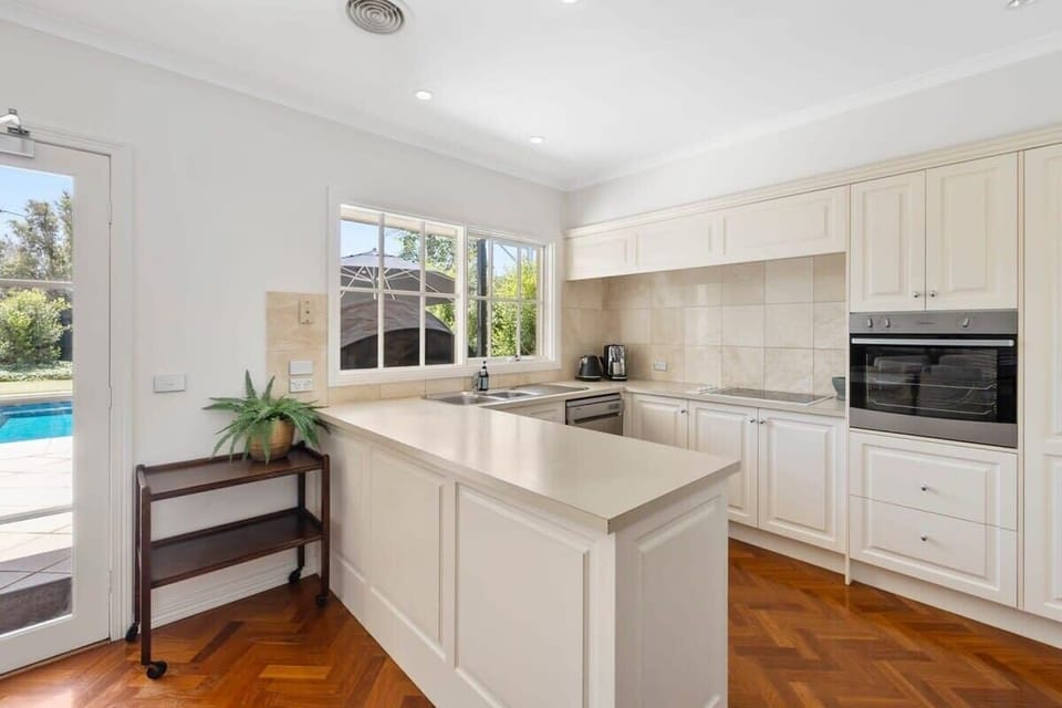 The kitchen has an electric oven and cooktop, dishwasher, fridge, microwave and coffee pod machine (a small selection of pods provided)