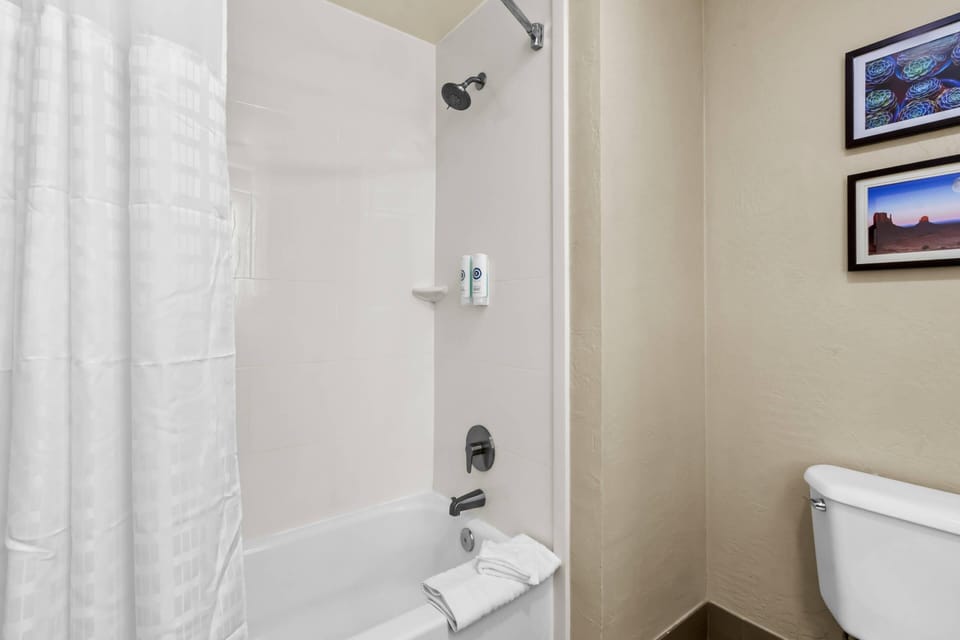 Superior Suite, Bed Room with King Bed, Living Room, Non-Smoking | Premium bedding, laptop workspace, blackout drapes, iron/ironing board