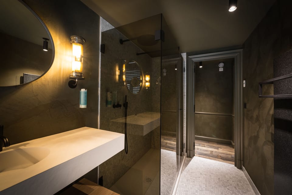 Designer toiletries, hair dryer, bathrobes, towels