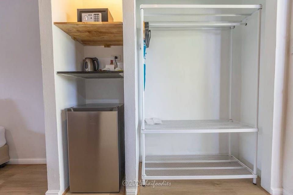 Deluxe Upper Floor Balcony | Minibar, in-room safe, individually decorated, individually furnished