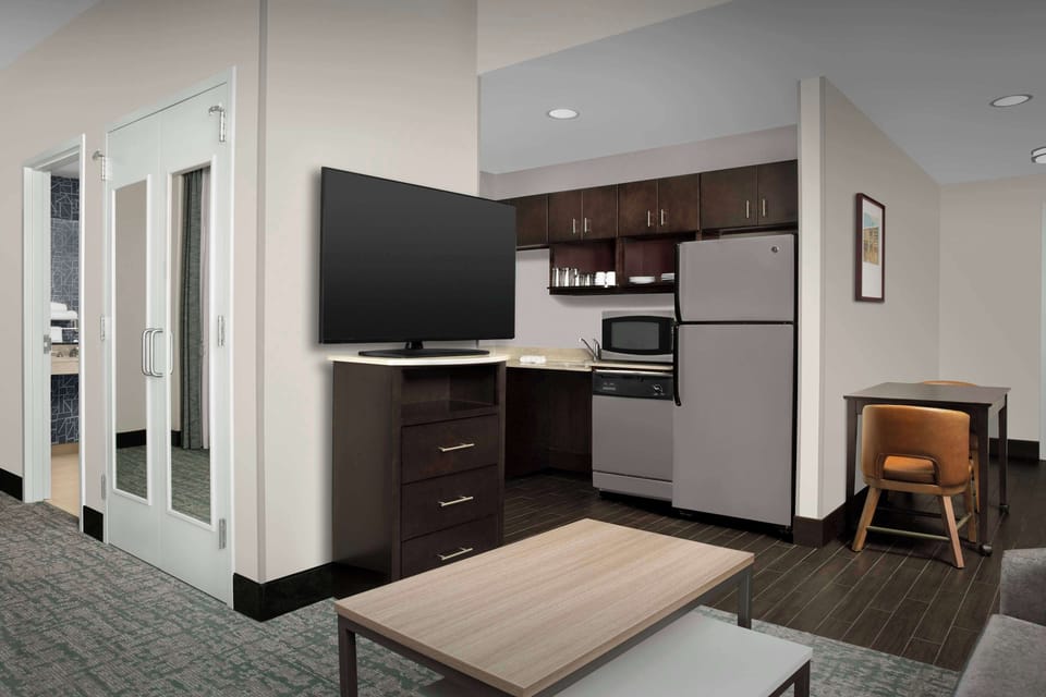 Suite, 1 King Bed, Accessible, Bathtub (Mobility & Hearing) | Private kitchen | Coffee/tea maker, full-size fridge, microwave, stovetop