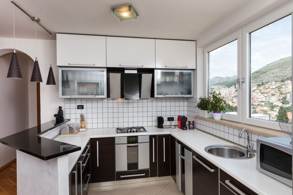 Apartment (Three Bedroom Apartment with Terrace,) | Private kitchen | Fridge