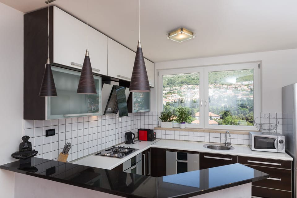 Apartment (Three Bedroom Apartment with Terrace,) | Private kitchen | Fridge