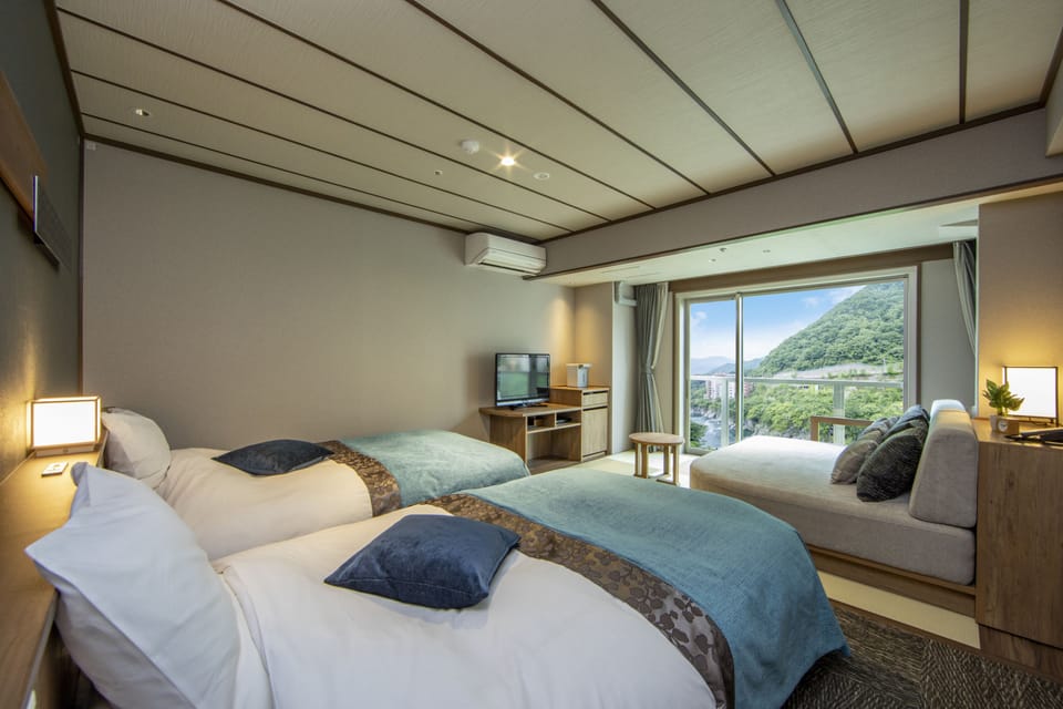 Twin Room with Tatami Area, Halfboard-Buffet, Non-smoking | In-room safe, WiFi (free), bed sheets