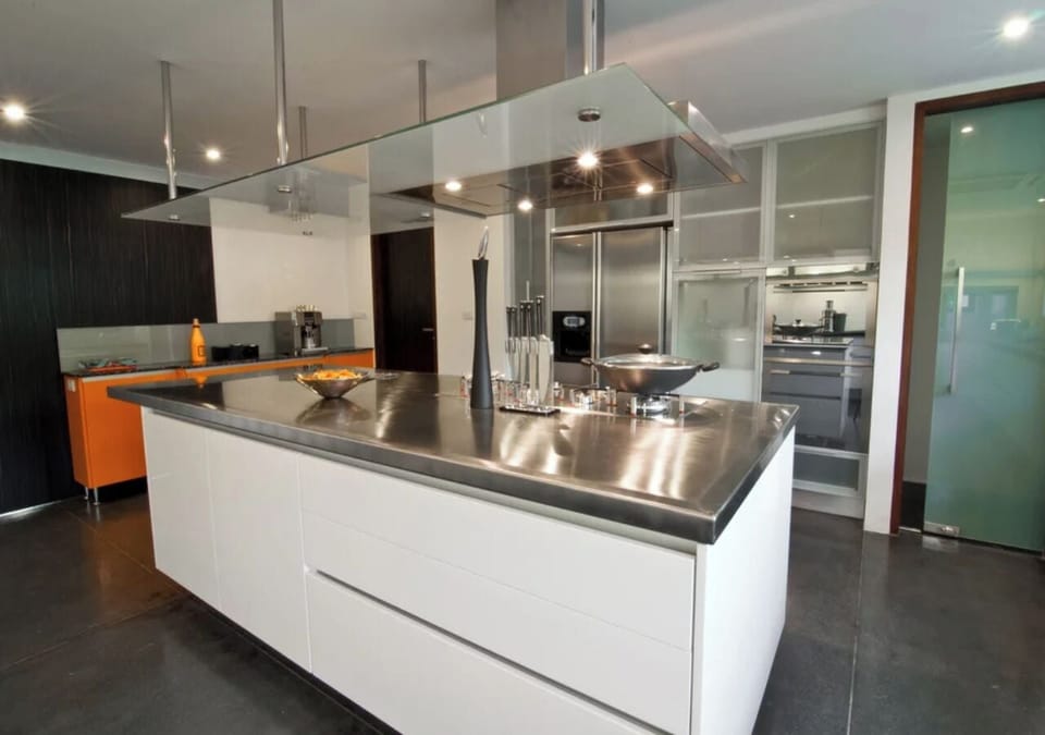 Luxury Villa | Private kitchen | Highchair, cookware/dishes/utensils, dining table