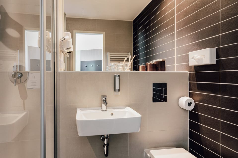 Shower, free toiletries, hair dryer, towels
