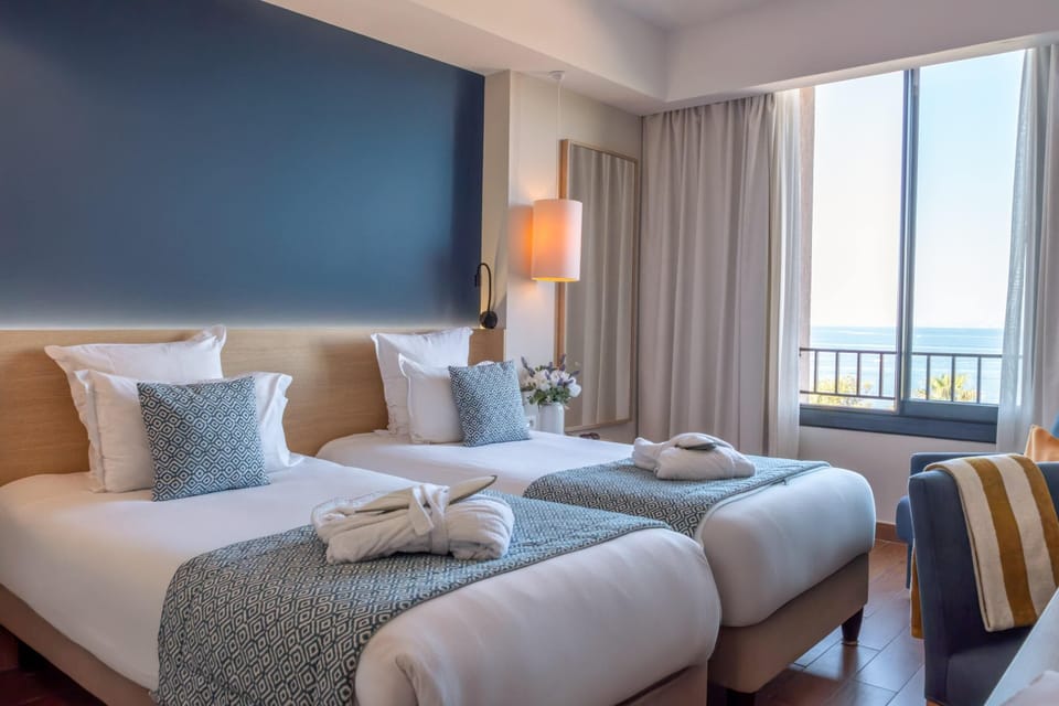 Superior Room | Minibar, in-room safe, individually furnished, desk