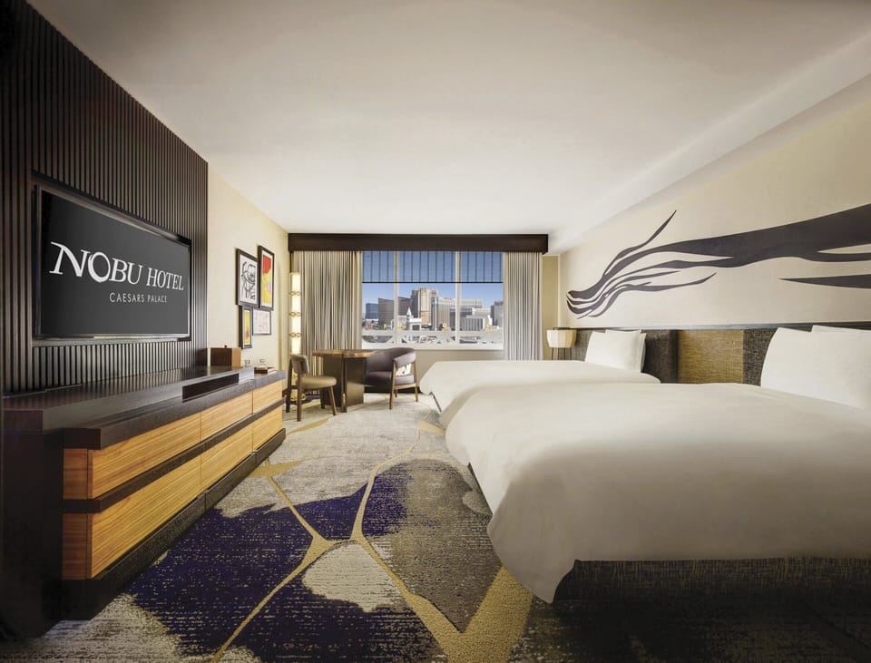 Premium bedding, pillowtop beds, minibar, in-room safe