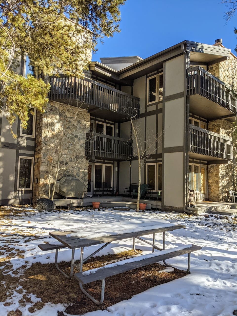 Entire building from back w/picnic table