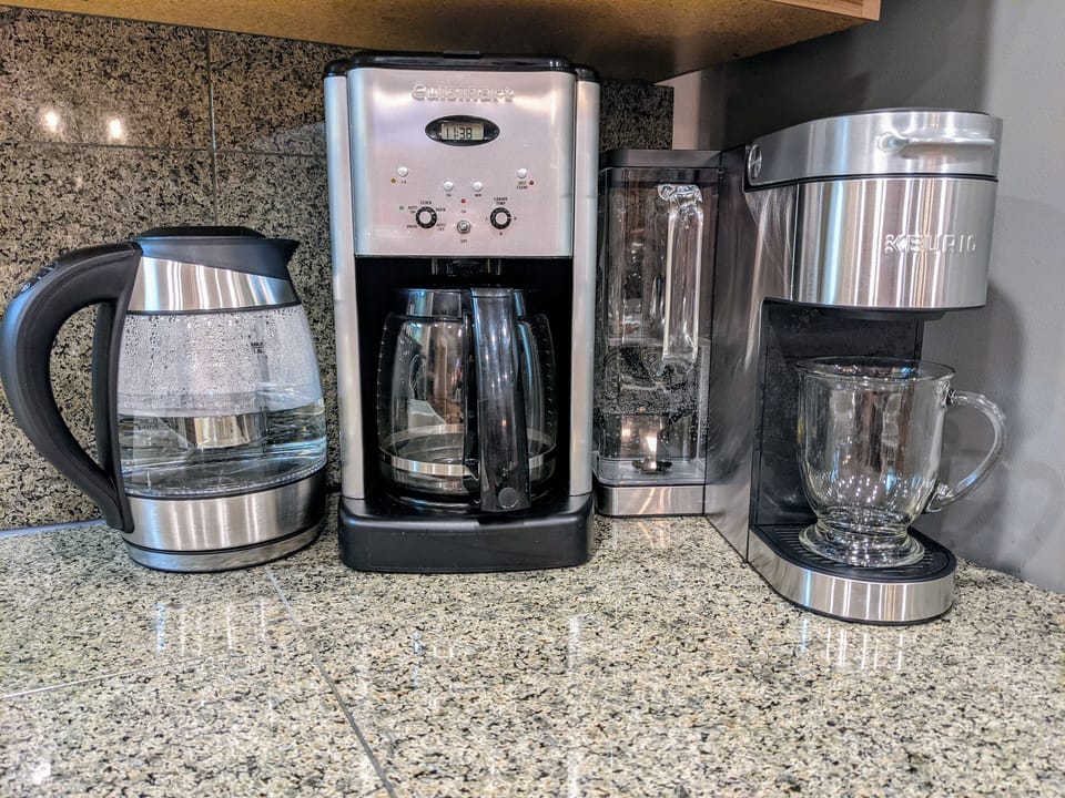 Coffee pods, drip coffee & a tea maker - you are all set!