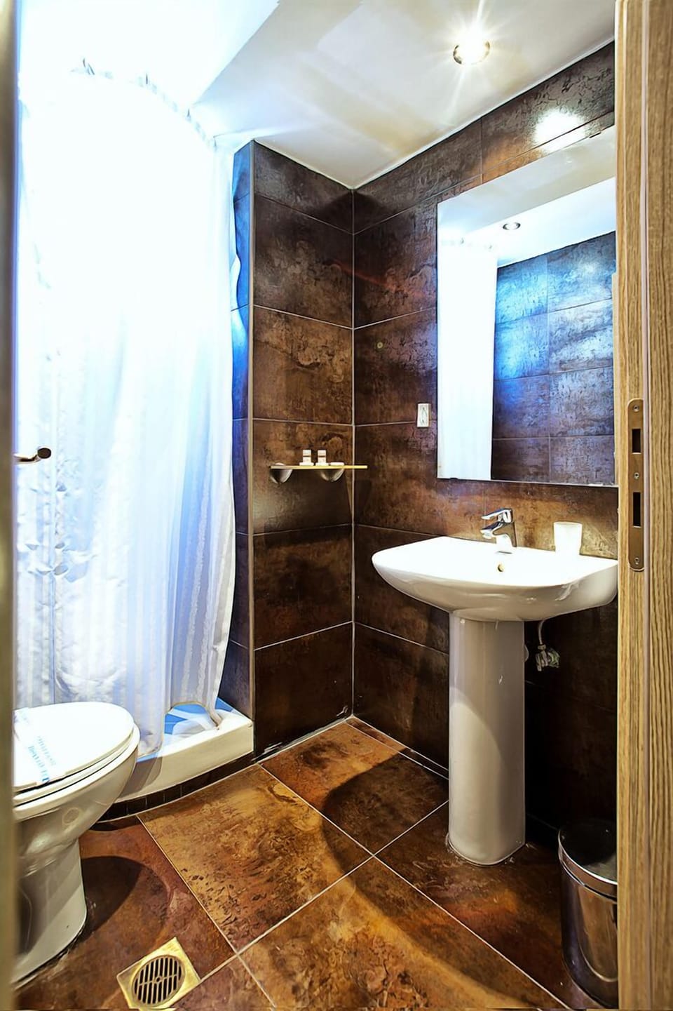 Shower, free toiletries, hair dryer, slippers