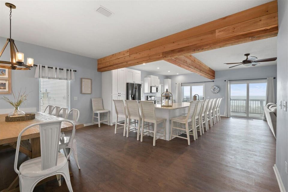 Extra-large kitchen with many barstools