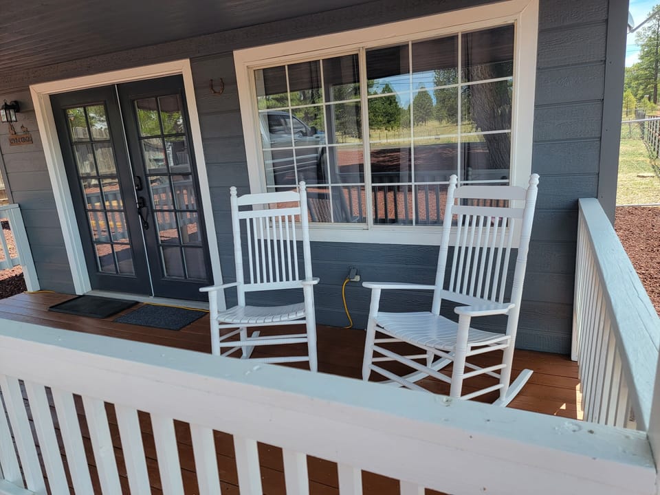 Front porch with rocking chairs