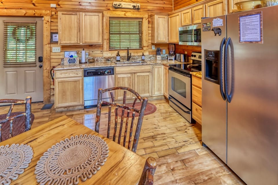 Open kitchen is well appointed with everything you need for cabin cooked meals.