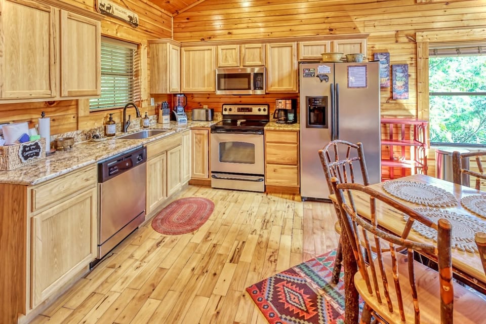 Open kitchen is well appointed with everything you need for cabin cooked meals.