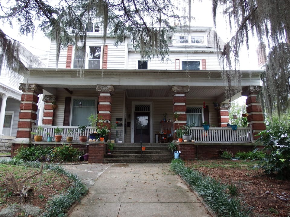 View from front steps leading up from street. Note there are a few steps.