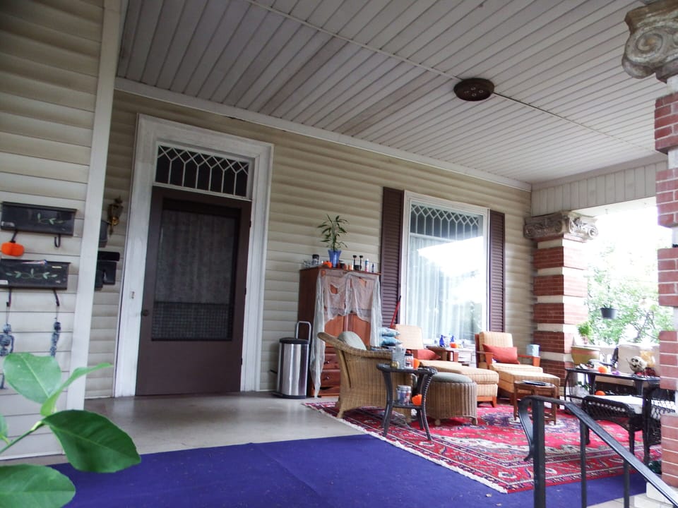 Large and inviting shared front porch. Porch time is magical.