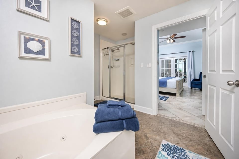 Indulge in relaxation in the master bath with a refreshing walk-in shower and soothing jetted tub