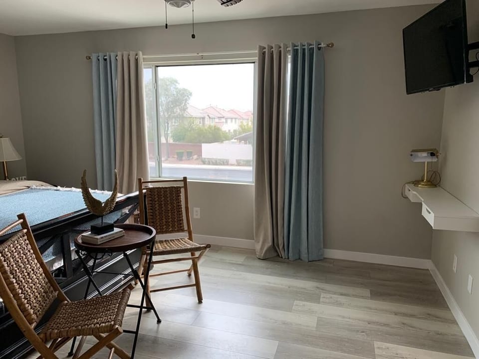 Master bedroom. King size bed, 40” smart TV and work space. 
