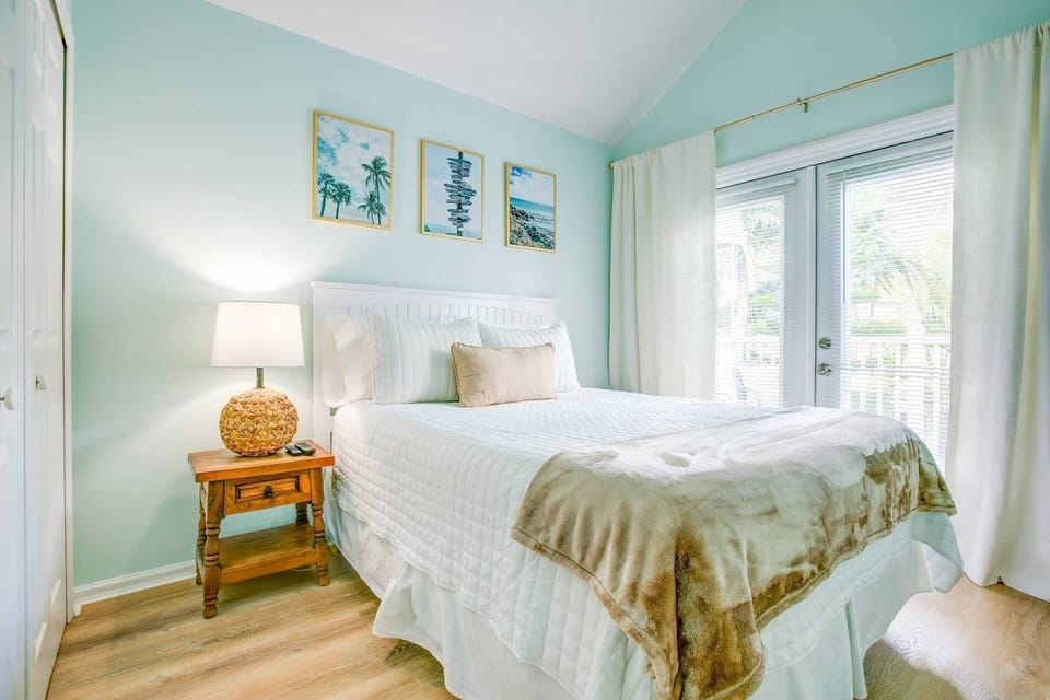 Unwind in the comfort of the queen bed in Bedroom 1, drifting into peaceful slumber after a splendid day in Key West.