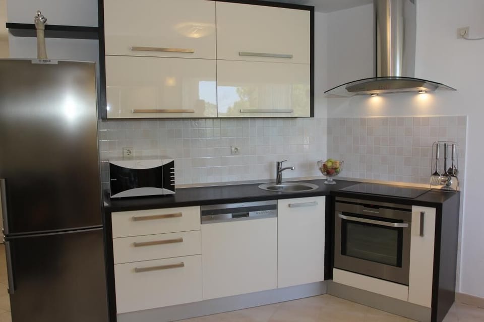 House (Three Bedroom Holiday Home with Pool) | Private kitchen | Fridge