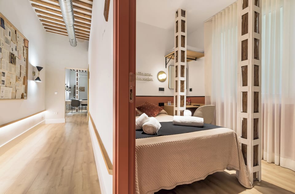 Economy Double Room | Down comforters, minibar, individually decorated, individually furnished