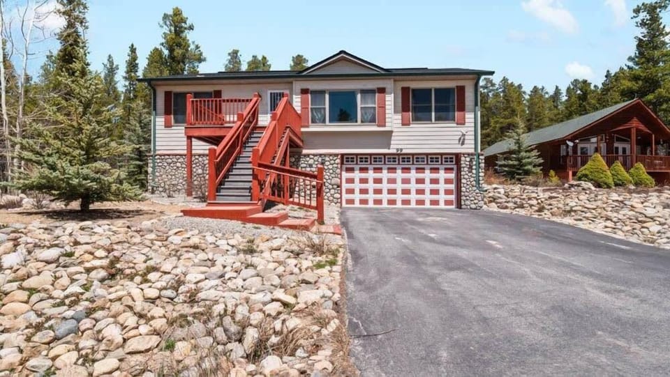 【2-Car Garage】 Heated — park inside, plus ping pong when you're not driving.