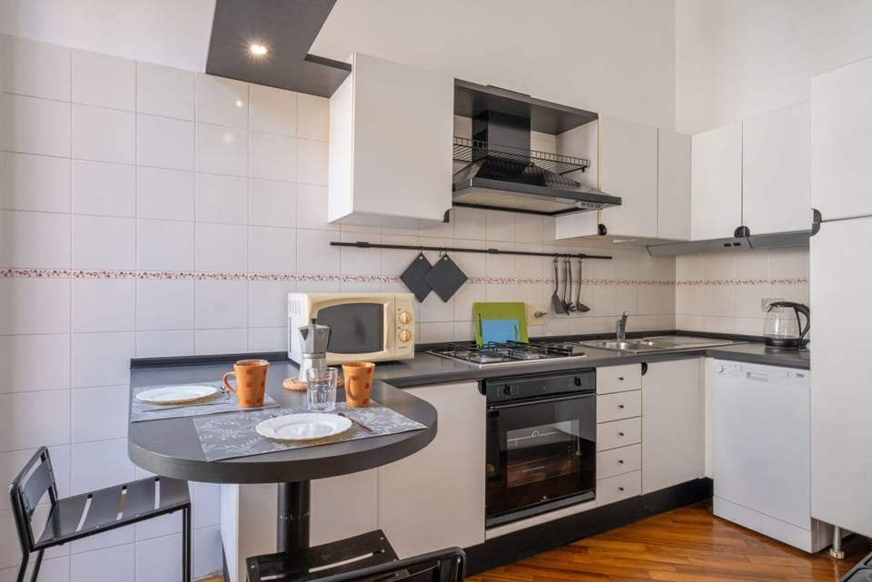 Apartment, 2 Bedrooms | Private kitchen | Full-size fridge, microwave, oven, stovetop