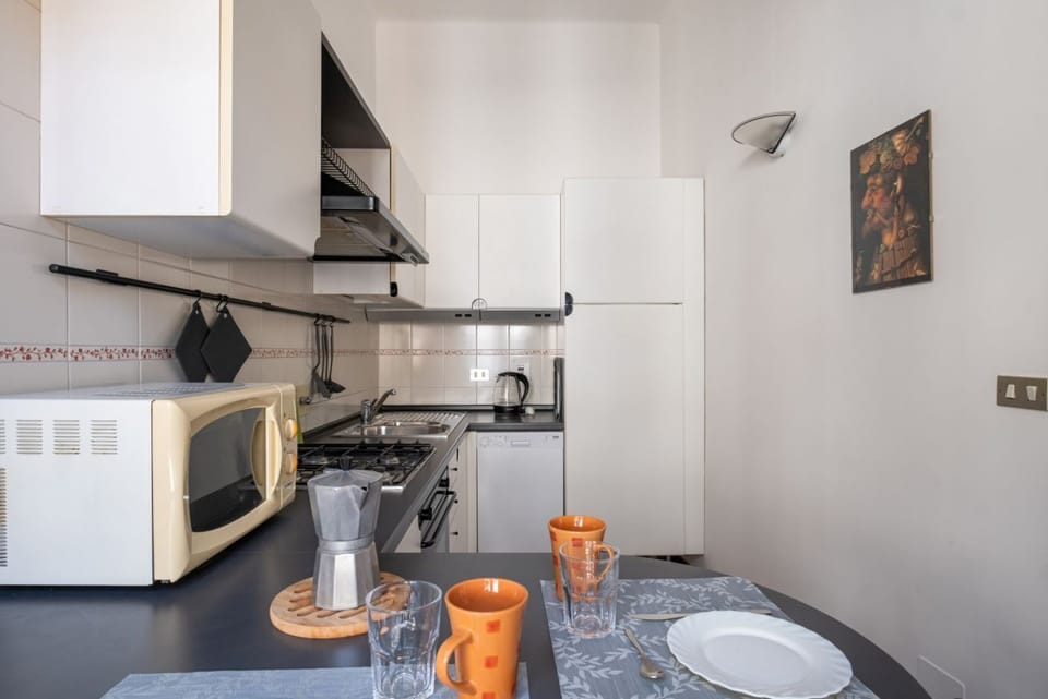 Apartment, 2 Bedrooms | Private kitchen | Full-size fridge, microwave, oven, stovetop