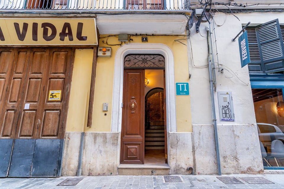 This is holiday apartments' entrance, where you can glimpse the entry hall. You enter the house with a keypad located outside. This building has no lift and the stairs are a bit steep although the staircase is wide, please take it into account when booking. Apartment 1 is at the first floor.