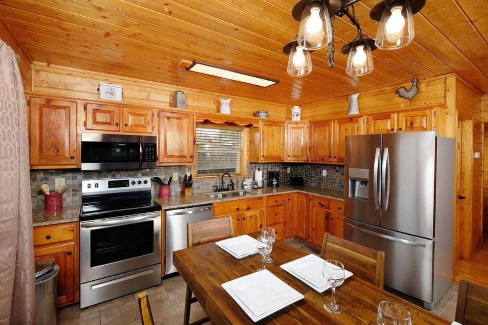 A fully equipped spacious kitchen has what you need for cooking family meals.