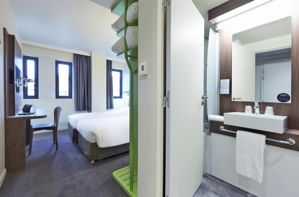 Shower, eco-friendly toiletries, hair dryer, towels