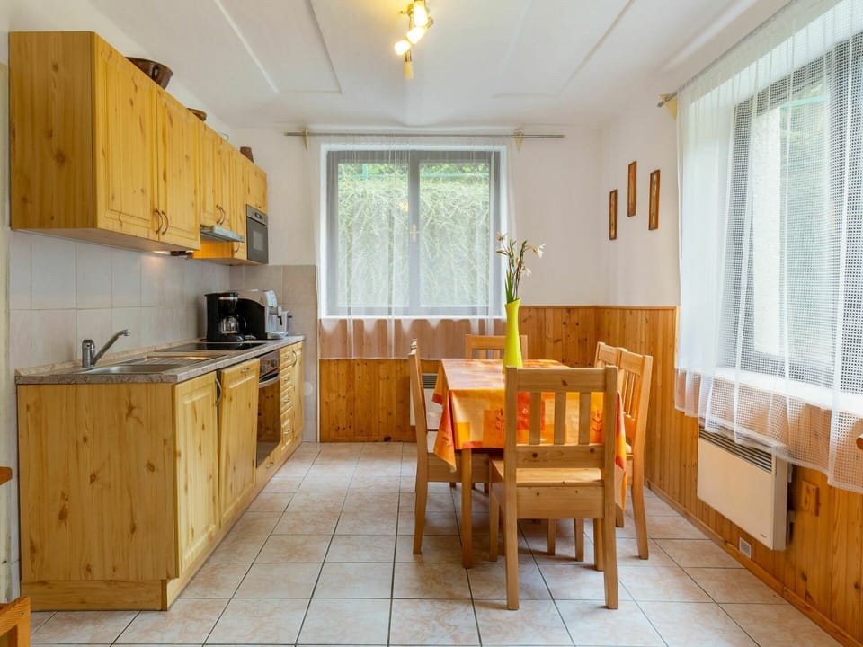 Cabinetry, Property, Window, Countertop, Wood, Table, Yellow, Lighting, Interior Design, Architecture