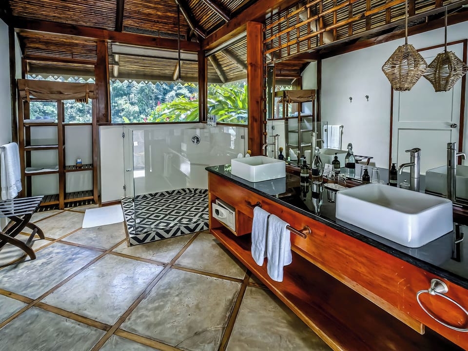 River View Suites | Bathroom | Eco-friendly toiletries, bathrobes, towels, soap