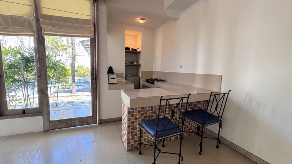 Deluxe Apartment A3 | Living area | 32-inch LCD TV with satellite channels, TV, DVD player