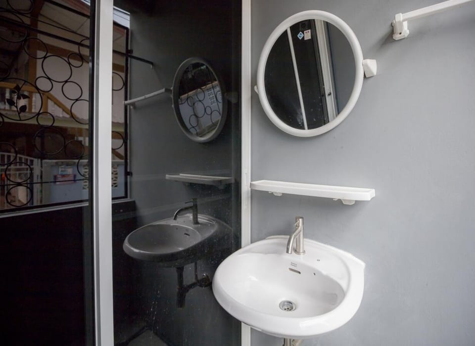 Shower, rainfall showerhead, bidet, towels