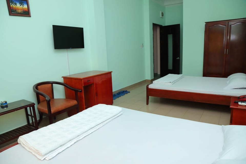 Standard Triple Room | Minibar, WiFi (free), bed sheets