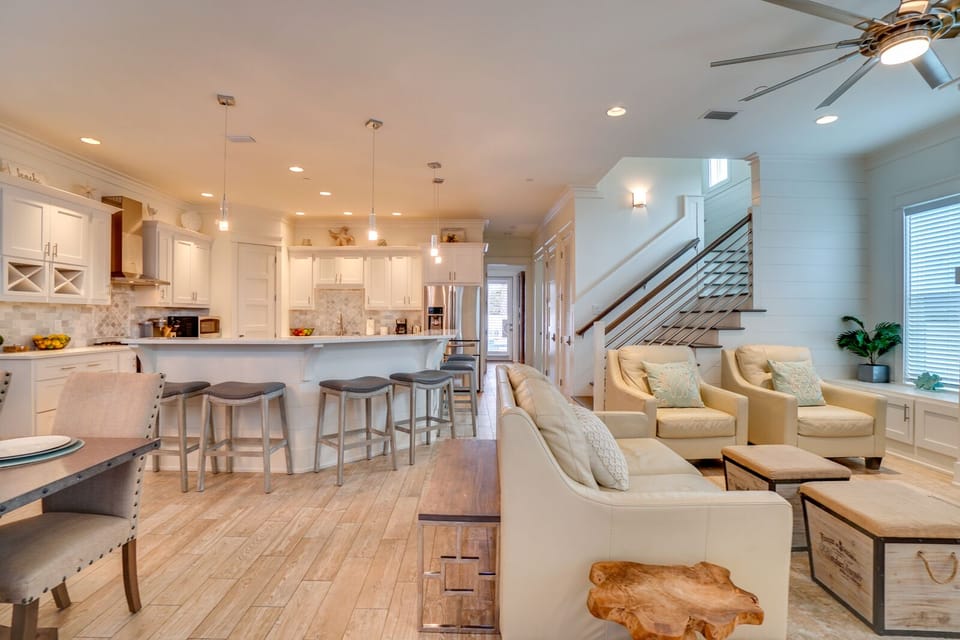 Relax in your bright, open-concept living space where kitchen meets comfort. The spacious island invites morning coffee while you plan your day.